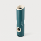 Frenzy Go Portable Ball Launcher in matte deep teal on a light neutral background
