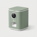 Watch & Treat Smart Pet Camera in matte sage green on a light neutral background