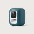 Snack Cam Mini Treat Dispenser in matte deep teal on a light neutral background