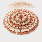 Forage Snuffle Mat in cream and terracotta felt on a light neutral background