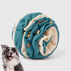 Cutaway view of the Snuffle Sphere showing fabric folds with treats