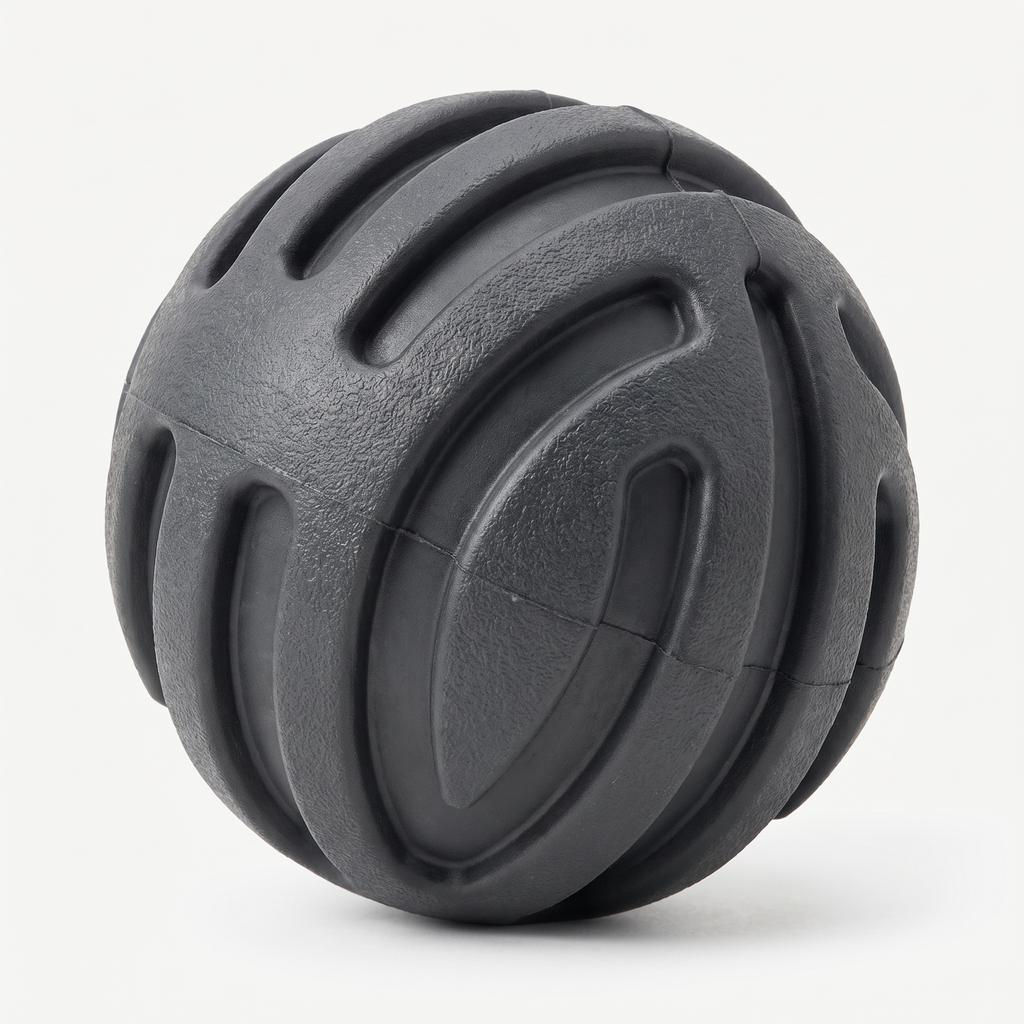 Herding Ball Extreme Chew Fetch Ball in matte charcoal grey on a light neutral background