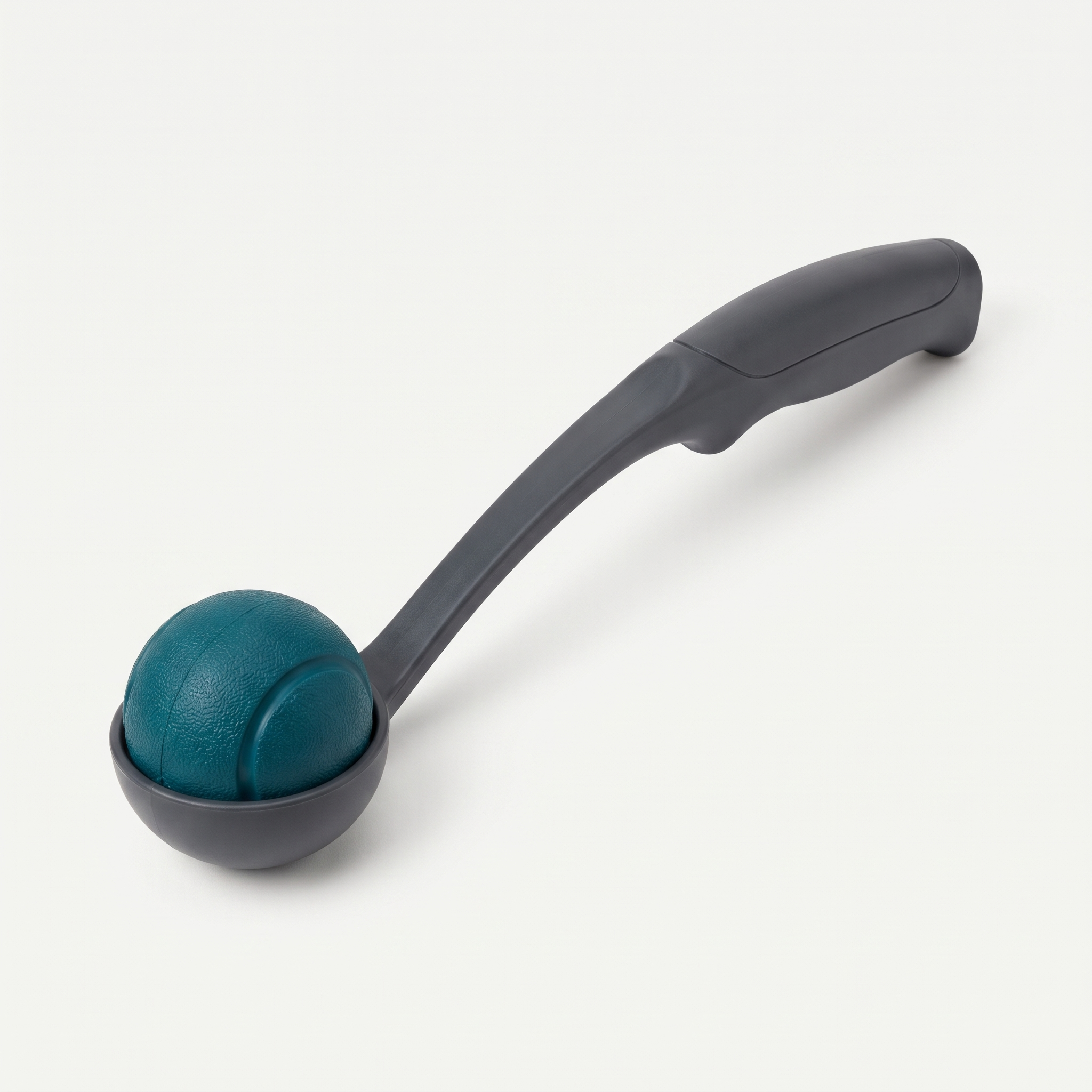 Squeak & Throw Ball + Thrower Set in deep teal and charcoal grey on a light neutral background