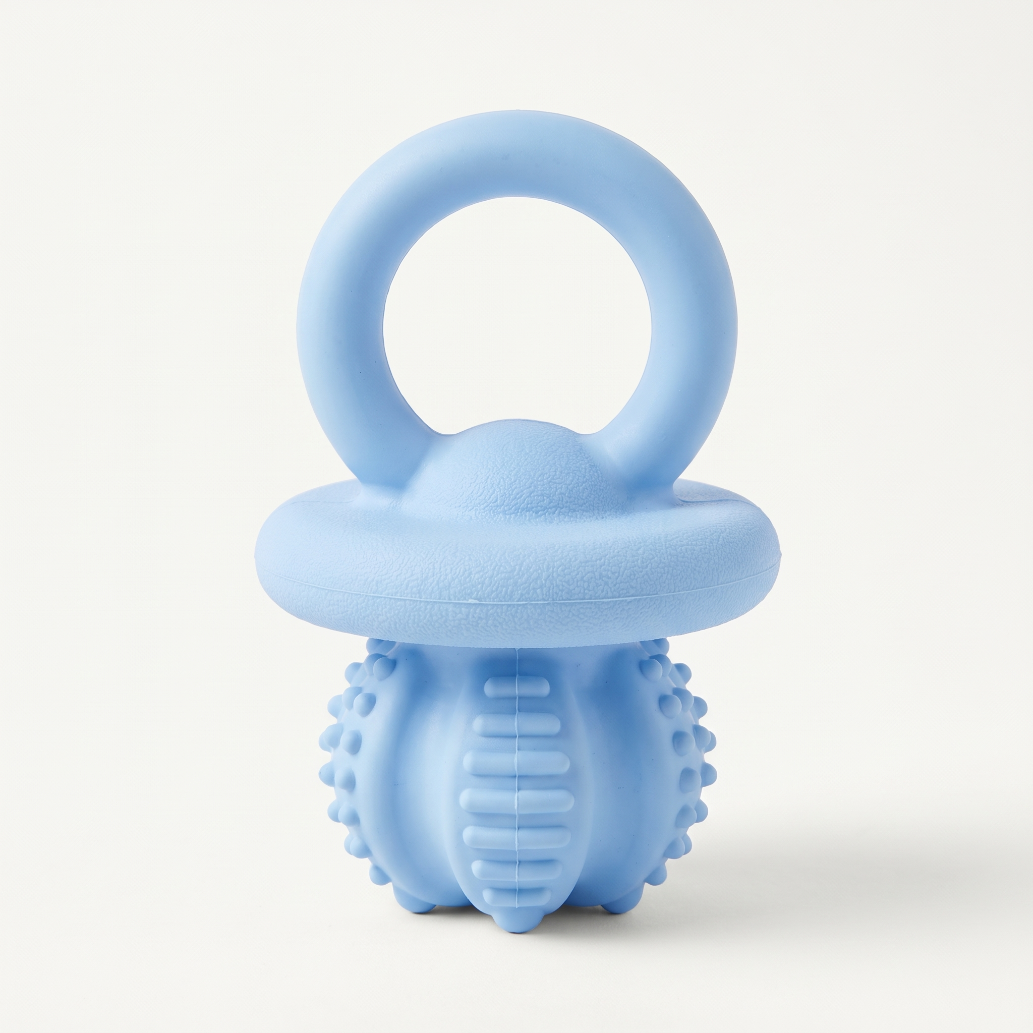 Puppy Soft Bite Teething Chew in soft pastel blue on a light neutral background