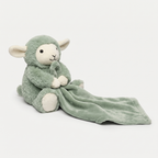 Calm Den Weighted Comfort Toy in soft sage green plush on a light neutral background