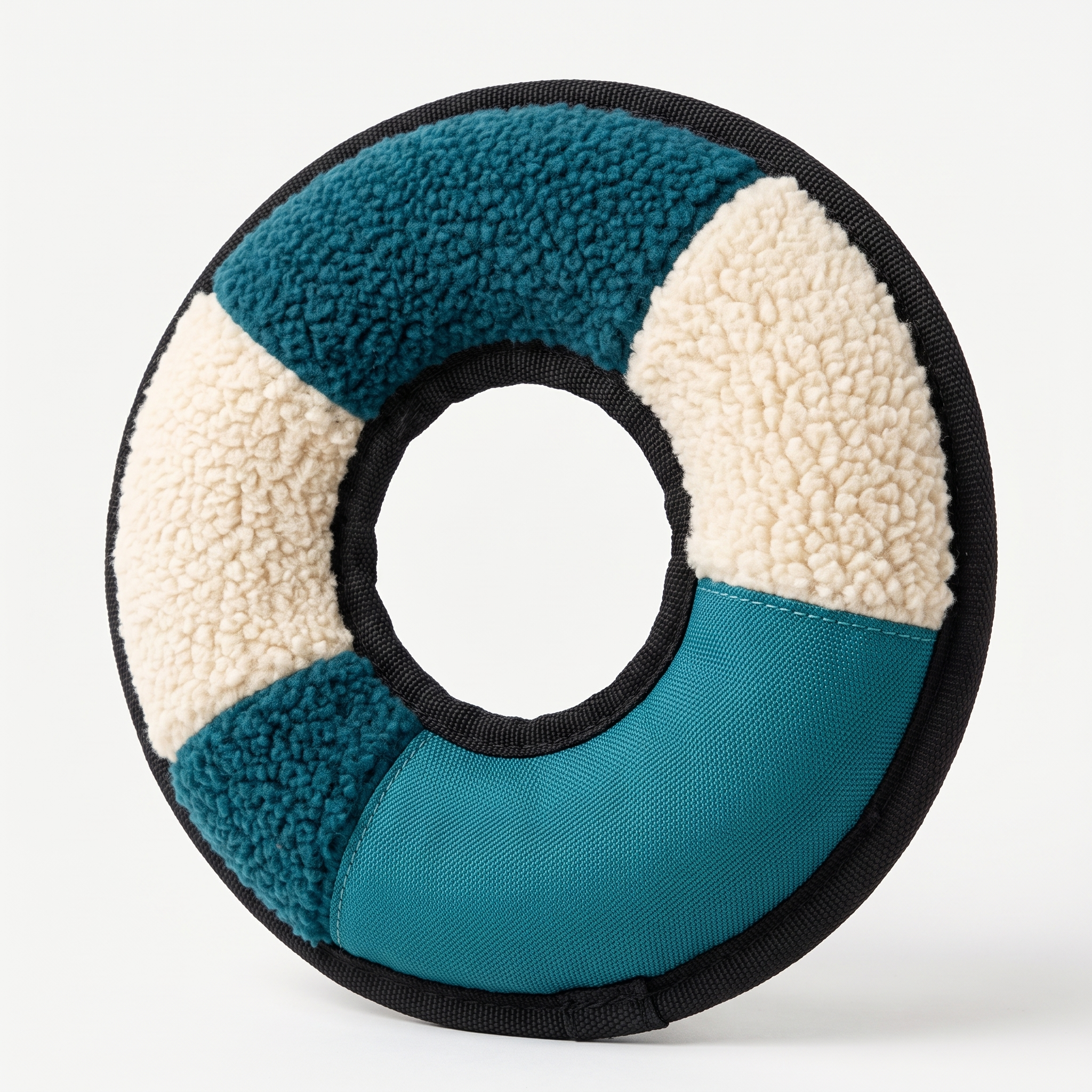 Sensory Stack Textured Ring in deep teal and cream on a light neutral background