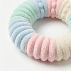 Close-up detail of Puppy's First Toy Box soft ring chew toy texture